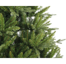 Gros plan d''un arbre de Noël artificiel avec des aiguilles vertes