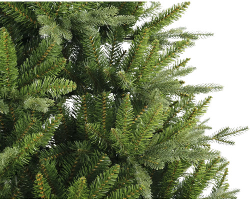 Gros plan d''un arbre de Noël artificiel avec des aiguilles vertes