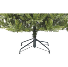 Vue détaillée d''un sapin de Noël artificiel avec un pied en métal