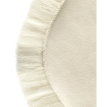 Gros plan d''un tapis rond avec des franges décoratives