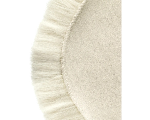 Gros plan d''un tapis rond avec des franges décoratives