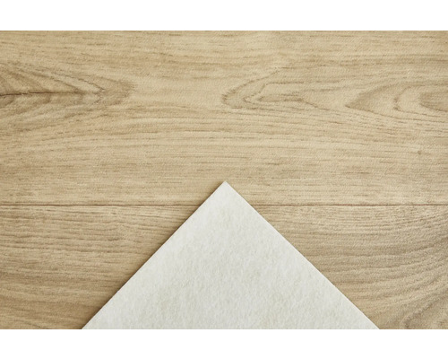 Tissu non tissé blanc sur fond en bois