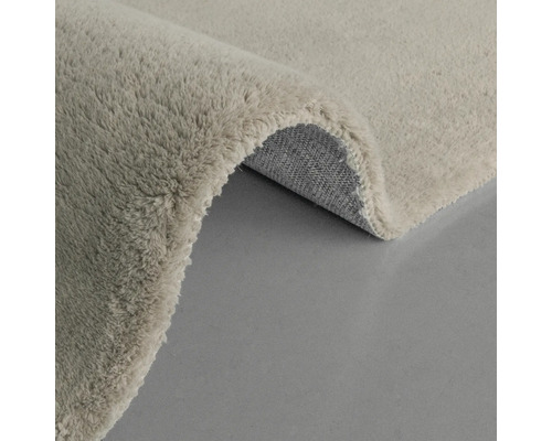 Detailansicht eines hellen Teppichs mit Flor