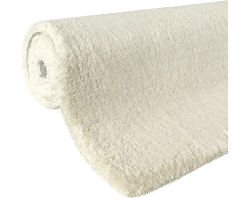 Gerollter, heller Teppich mit weicher Oberfläche