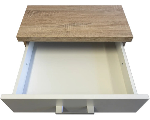 Geöffnete Schublade aus Holz und Kunststoff