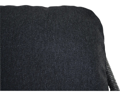 Gros plan d'une chaise sombre avec revêtement en tissu