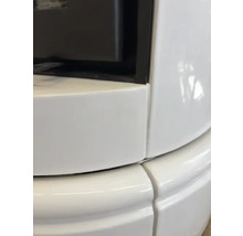 Vue détaillée d'un poêle en faïence avec revêtement en céramique blanche