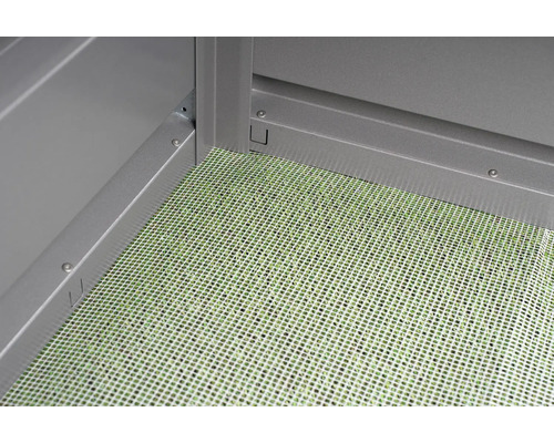 Vue détaillée du plancher d''une remise avec grille