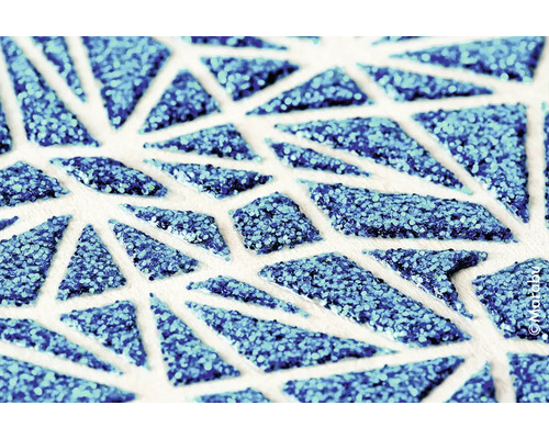 Detailaufnahme eines Dekoelements mit geometrischem Muster und glitzernder Oberfläche