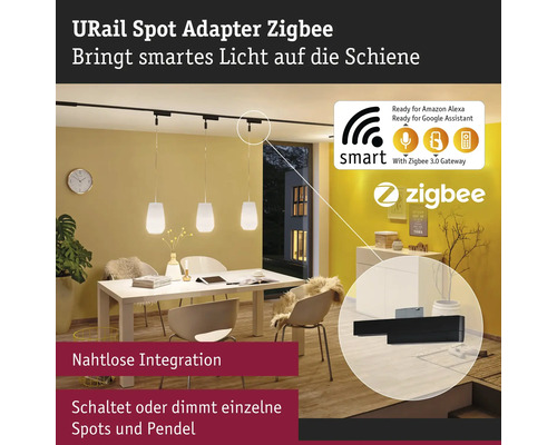 URail Spot Adapter Zigbee in einem Esszimmer mit Pendelleuchten über einem Esstisch.