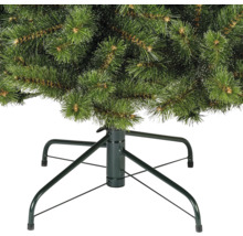 Vue détaillée d'un arbre de Noël artificiel avec un pied en métal