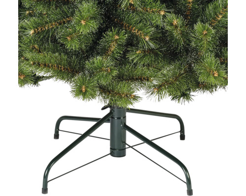 Vue détaillée d'un arbre de Noël artificiel avec un pied en métal