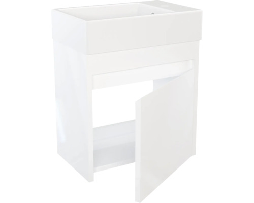 Meuble sous-vasque blanc avec porte ouverte
