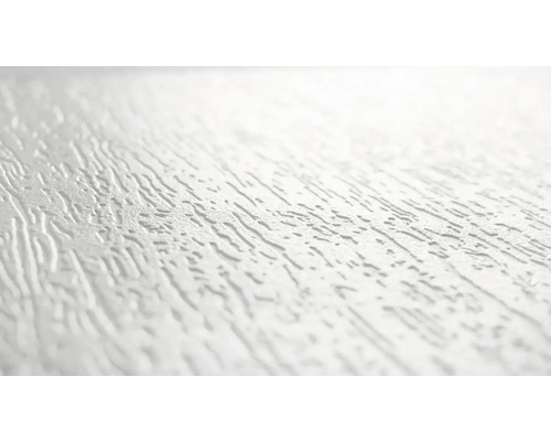 Nahaufnahme einer weißen Putzoberfläche mit unregelmäßiger Struktur