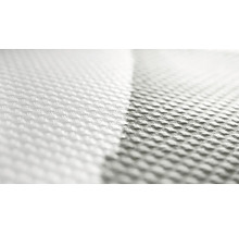 Gros plan d''un tissu blanc texturé et tissé
