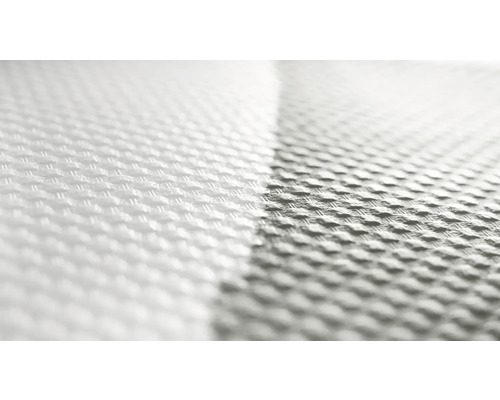 Gros plan d''un tissu blanc texturé et tissé