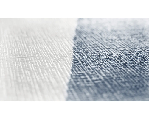 Gros plan d''un papier peint blanc et d''un papier peint à motifs