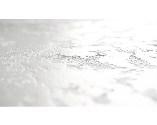 Gros plan d''une surface d''enduit texturée