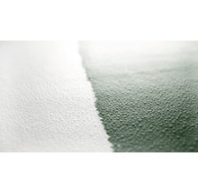 Detailansicht einer Strukturfarbe auf einer Wand