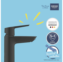 Schwarzer Wasserhahn mit Grohe Logo, dem Hinweis entwickelt und konstruiert in Deutschland, QuickTool enthalten und erweiterter Garantie.
