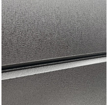 Gros plan d'une surface noire thermolaquée avec une texture légère