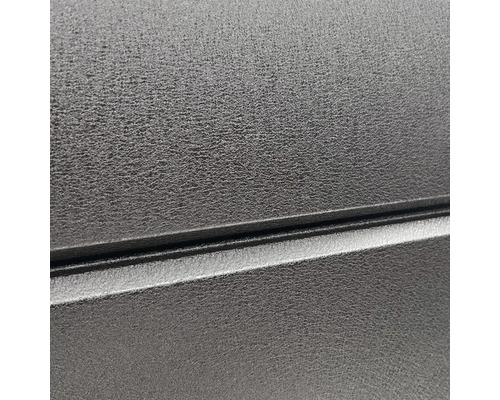 Gros plan d'une surface noire thermolaquée avec une texture légère