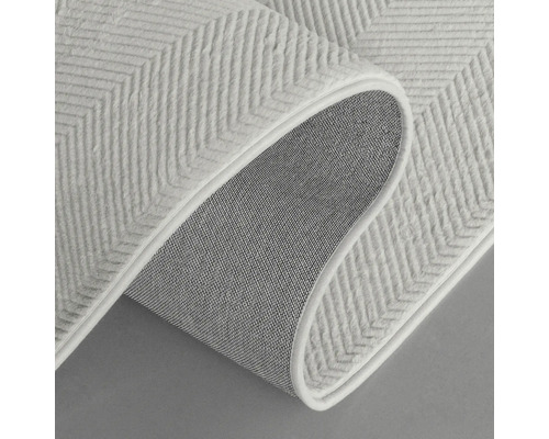 Detailansicht eines Teppichs mit Zickzackmuster