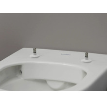 Vue détaillée de toilettes Duravit blanches avec fixation