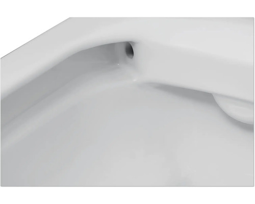 Gros plan d'un lavabo avec trop-plein
