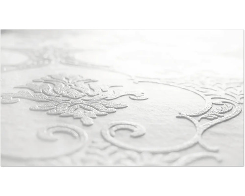 Detailansicht einer weißen Tapete mit floralem Muster