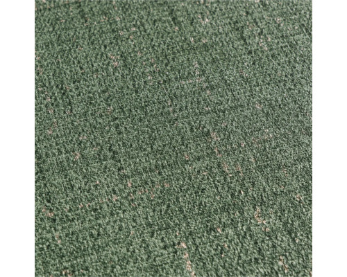 Vue détaillée d'un tapis vert à la texture fine