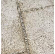 Gros plan d'un papier peint texturé avec un motif de couture