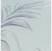 Gros plan d'un papier peint avec motif végétal