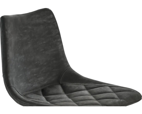 Gros plan d'une chaise avec assise matelassée
