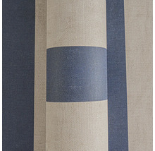 Gros plan d'un rouleau de papier peint à rayures