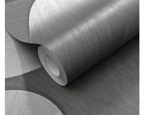 Eine Rolle Tapete mit einem abstrakten Kreisdesign.