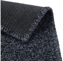 Vue détaillée d'un tapis de propreté gris avec une texture tissée
