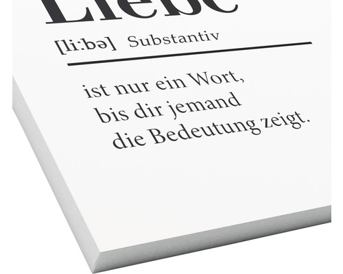 Dekoratives Wandbild mit dem Schriftzug Liebe ist nur ein Wort.