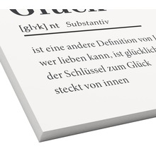 Dekoration mit dem Text: Definition von Glück