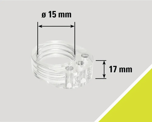 Adaptateur transparent d'une hauteur de 17 millimètres et d'un diamètre de 15 millimètres.