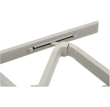 Vue détaillée d'une table pliante avec cadre métallique et pièces de connexion.