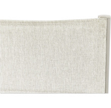 Détail du revêtement textile d'un fauteuil de jardin