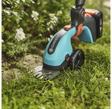 Cisailles à gazon sans fil Gardena en utilisation dans le jardin.