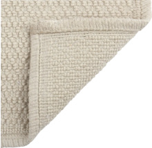 Vue détaillée d'un tapis à texture tissée