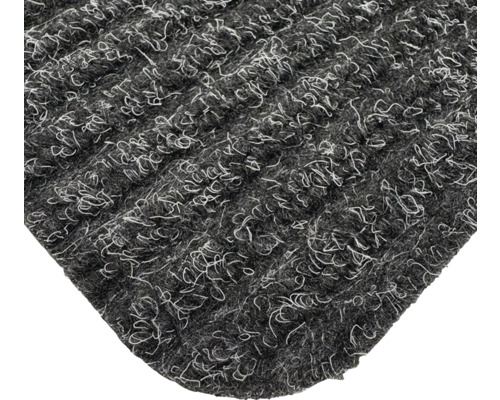 Detailansicht einer grauen Eingangsmatte mit Textiloberfläche