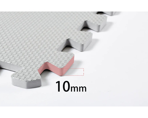 Gros plan d'un tapis de jeu puzzle d'une épaisseur de 10 mm.