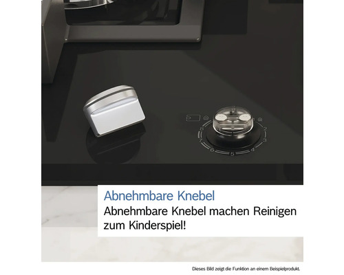 Detailansicht eines Kochfelds mit abnehmbaren Knöpfen