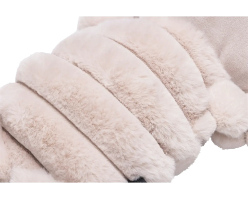 Gros plan d'une housse de coussin décorative avec une texture de fourrure