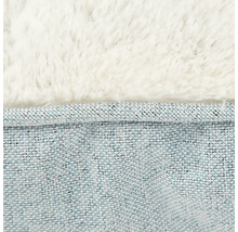 Detailansicht eines Tierbetts mit Textiloberfläche und weichem Plüsch