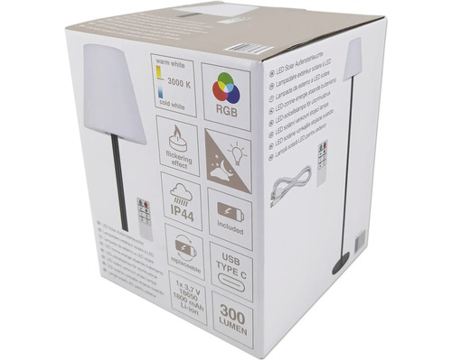 Emballage d'un lampadaire solaire extérieur à LED avec des détails techniques tels que lumière blanc chaud, 3000 Kelvin, mode de couleur RGB, effet de scintillement, indice de protection IP44, port de charge USB Type C inclus et intensité...